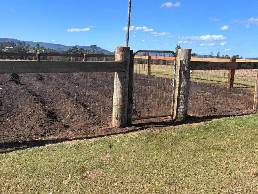Walk-through gate in a post and rail fence